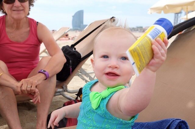 baby with sunscreen