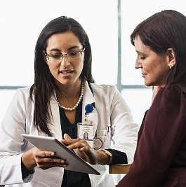 patient talking with her doctor